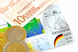 Foto: Geld und Versicherungskarte